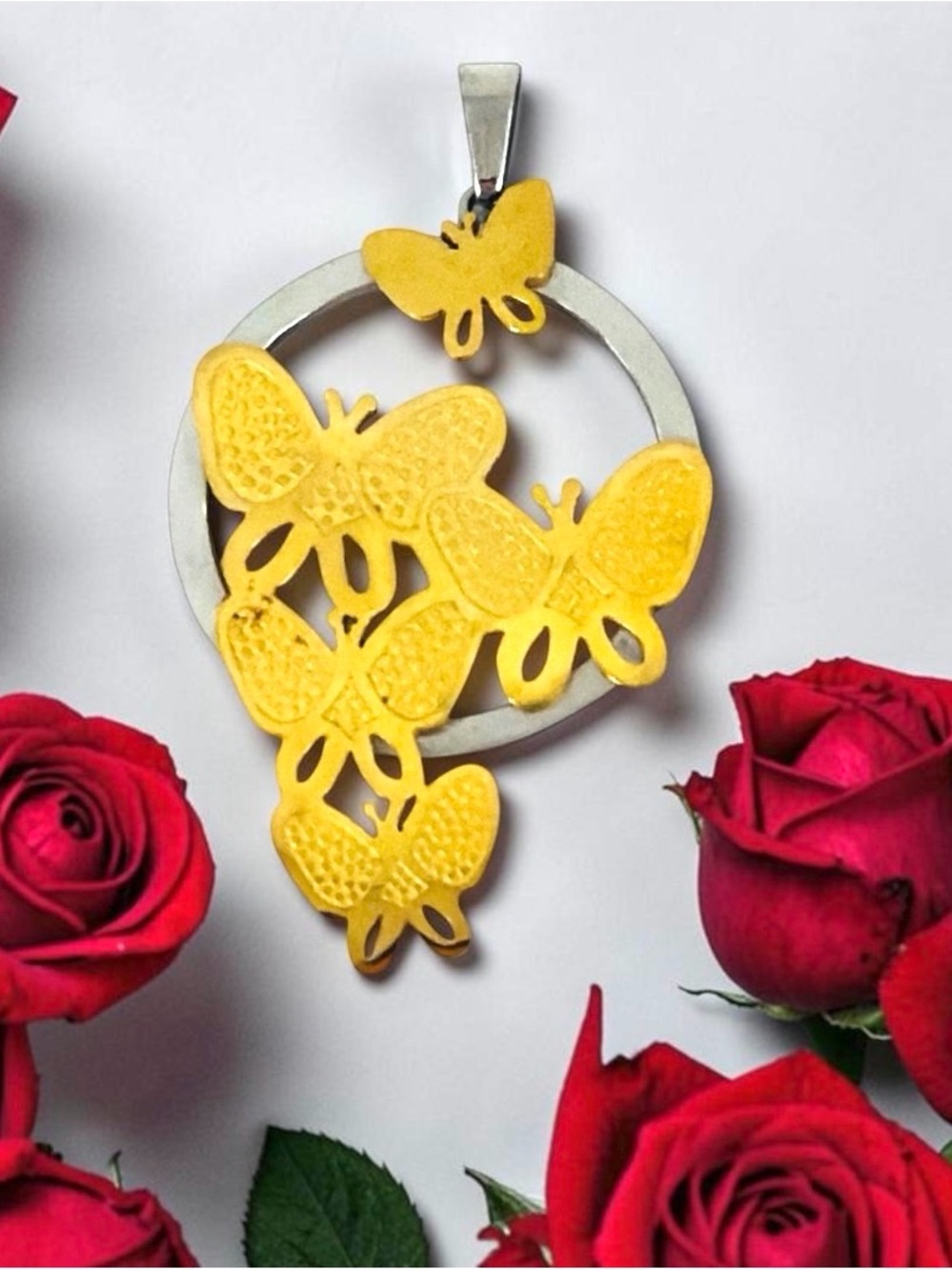 Stainless Steel Two-tone Golden/Silver Butterfly Pendant. Chain not included.